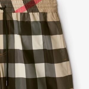Burberry Plaid Swim Shorts in Black, White, and Tan